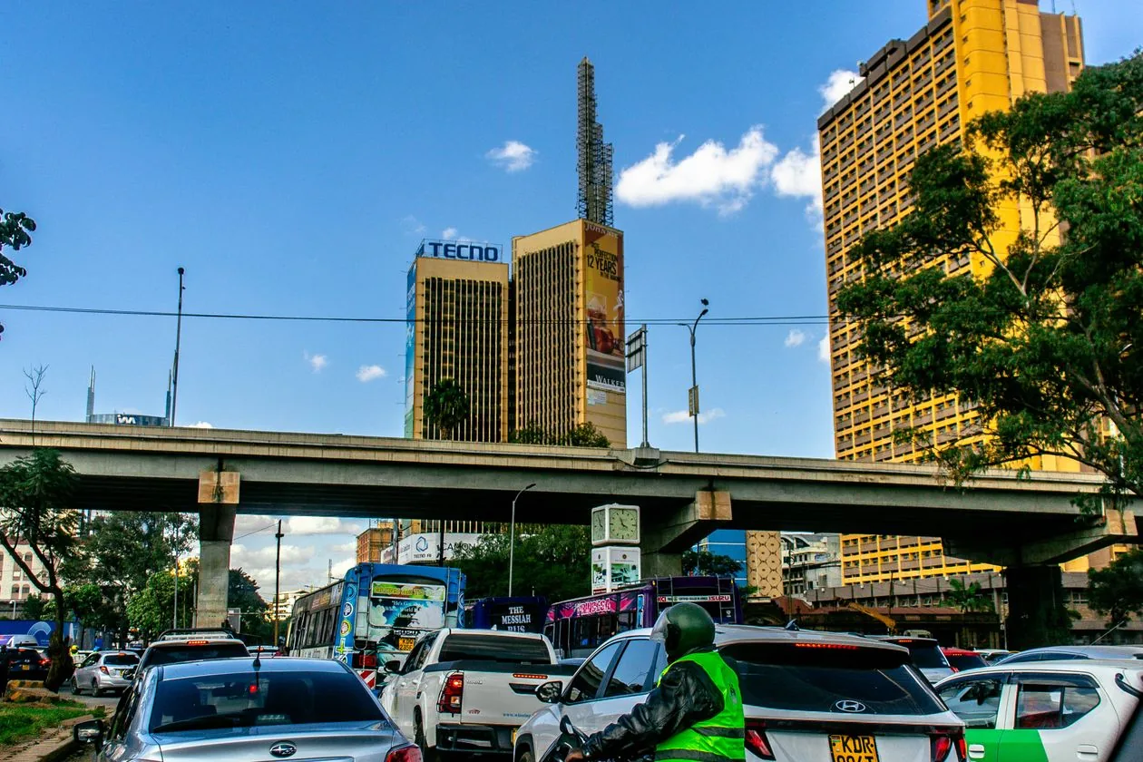 Nairobi street with traffic and tall buildings